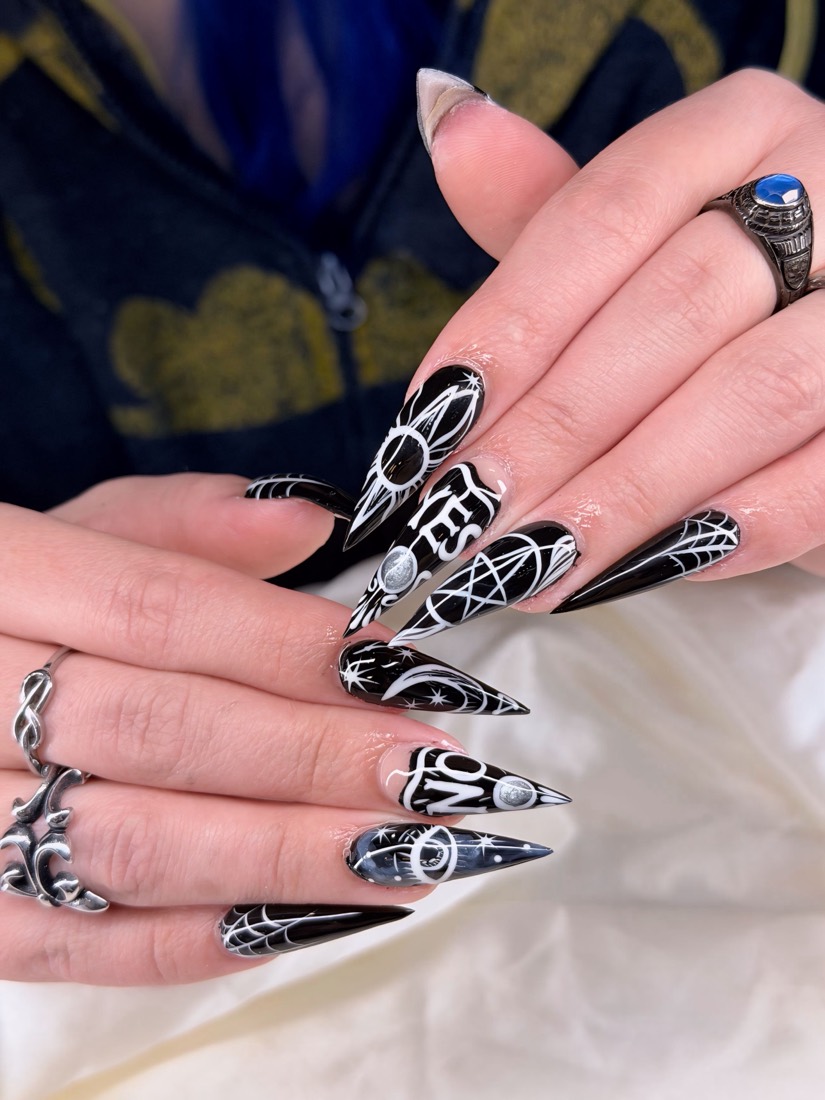 black and white nail art nails, stiletto shape — nail salon in Rome, GA — Sonny & Tee