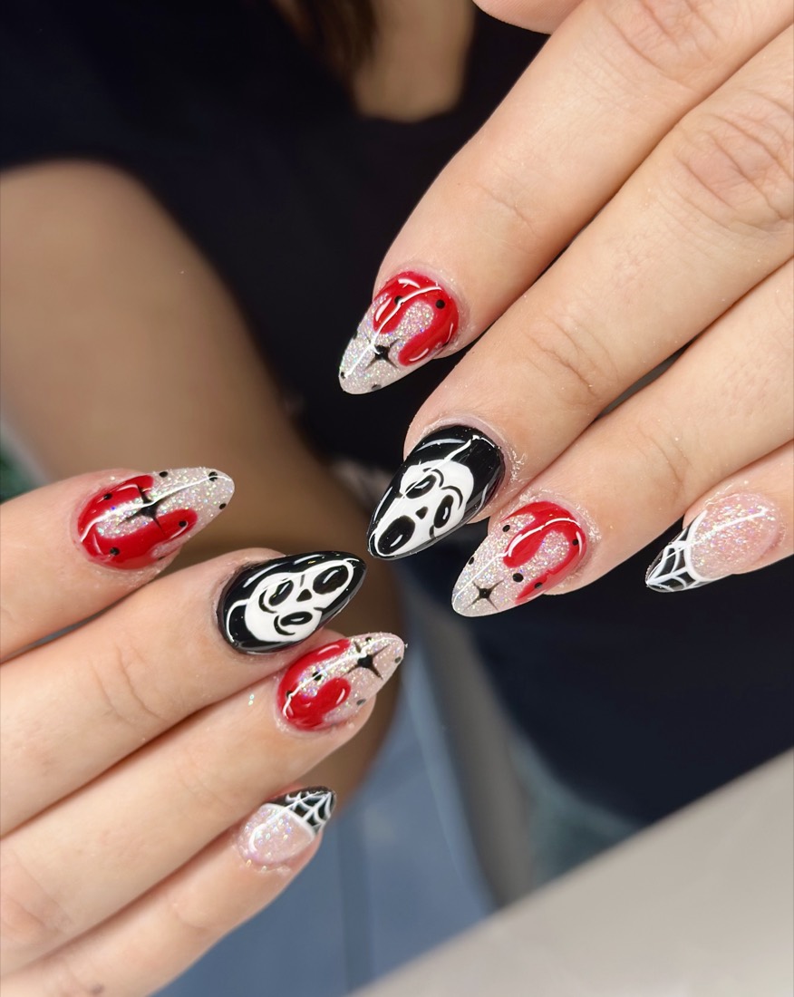 red and black nail art and glitter nails, almond shape — nail salon in Rome, GA — Sonny & Tee