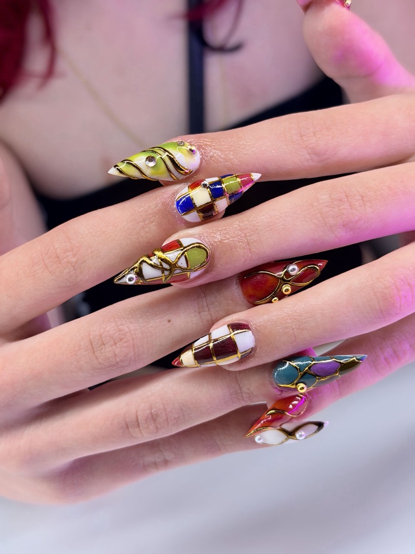 red and gold nail art nails, stiletto shape — nail salon in Rome, GA — Sonny & Tee