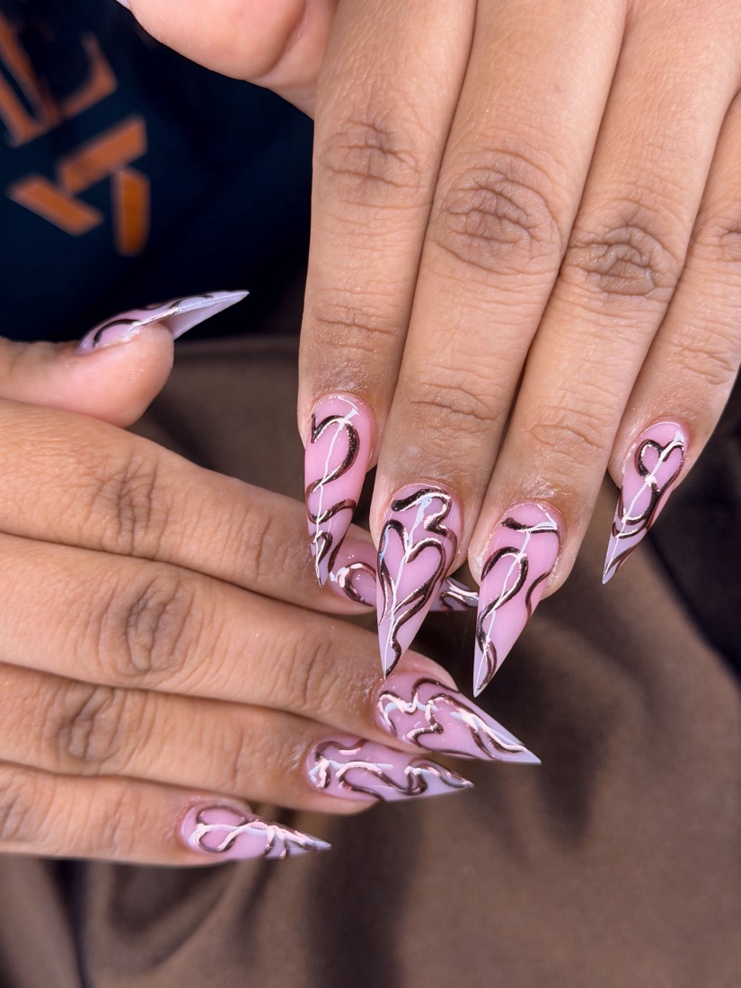 pink and black nail art nails, stiletto shape — nail salon in Rome, GA — Sonny & Tee